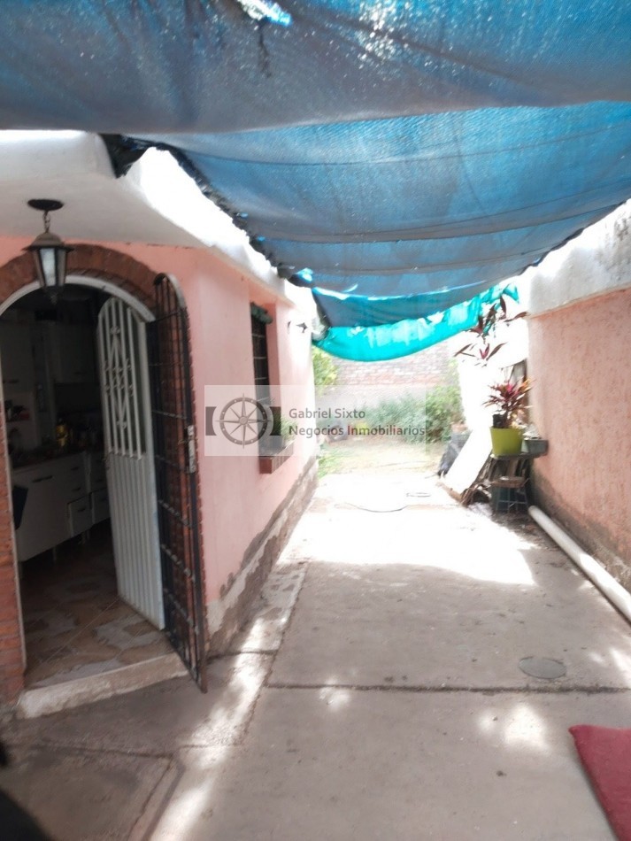 VENTA CASA B° 12 DE JUNIO NORTE LAS HERAS 2 DORM, COCHERA PASANTE 