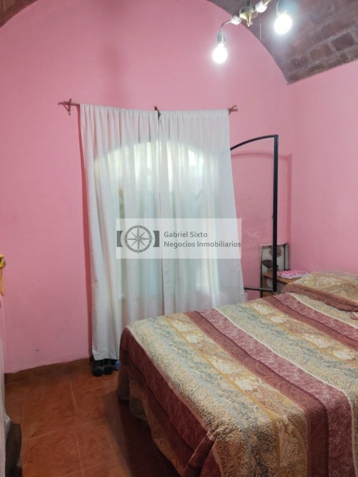 VENTA CASA B° 12 DE JUNIO NORTE LAS HERAS 2 DORM, COCHERA PASANTE 